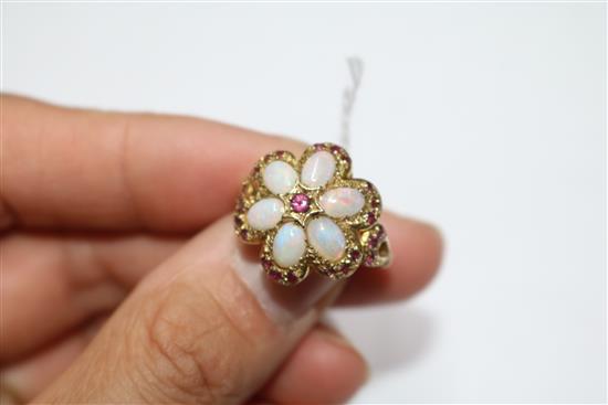 A 1970s 9ct gold, white opal and ruby cluster dress ring, size M.